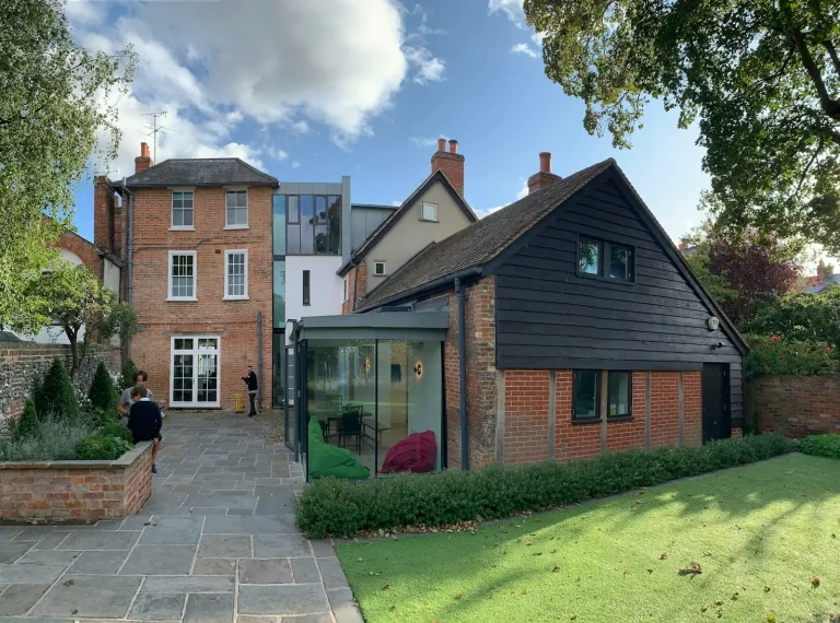 Brick house with a single-storey rear extension