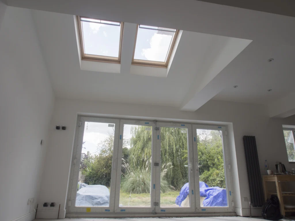 New extension room with rooflights and wide glazed doors